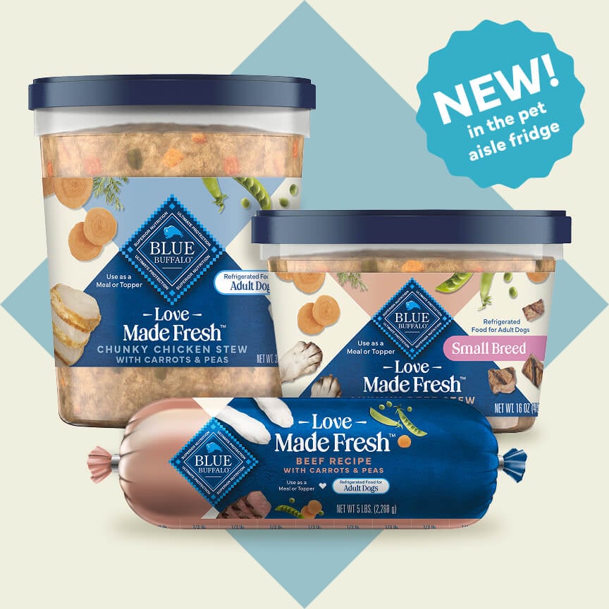 Tubs and a roll of Love Made Fresh refrigerated dog food are in front of a baby blue square rotated 90 degrees.