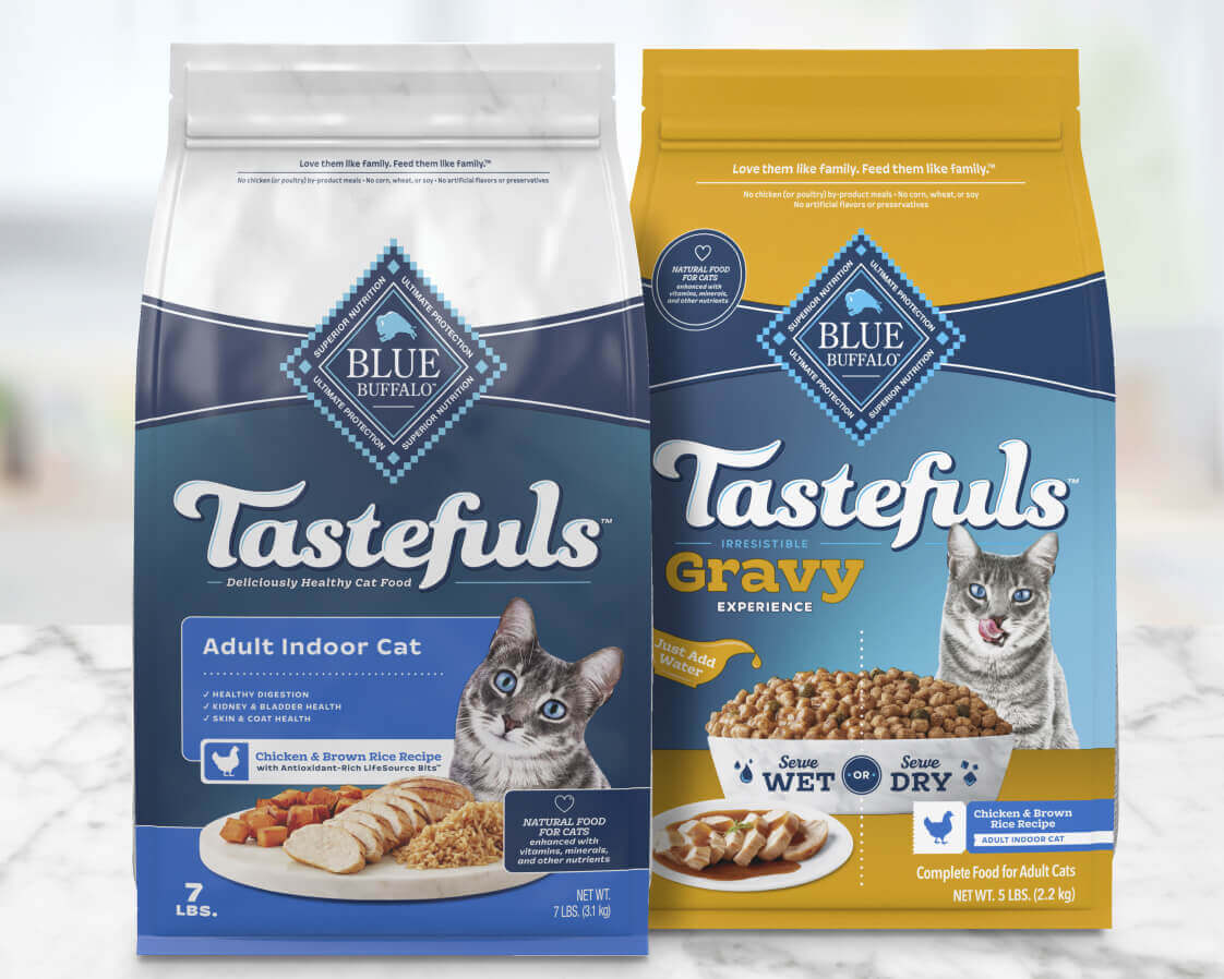 Two bags of Blue Buffalo Tastefuls cat food: one dry chicken recipe for indoor cats, one chicken & brown rice with gravy.