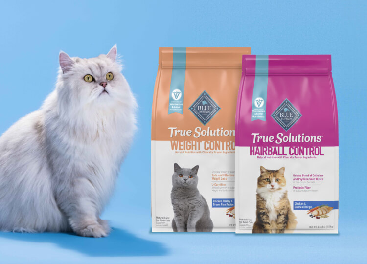 Bags of BLUE True Solutions Cat Dry Food