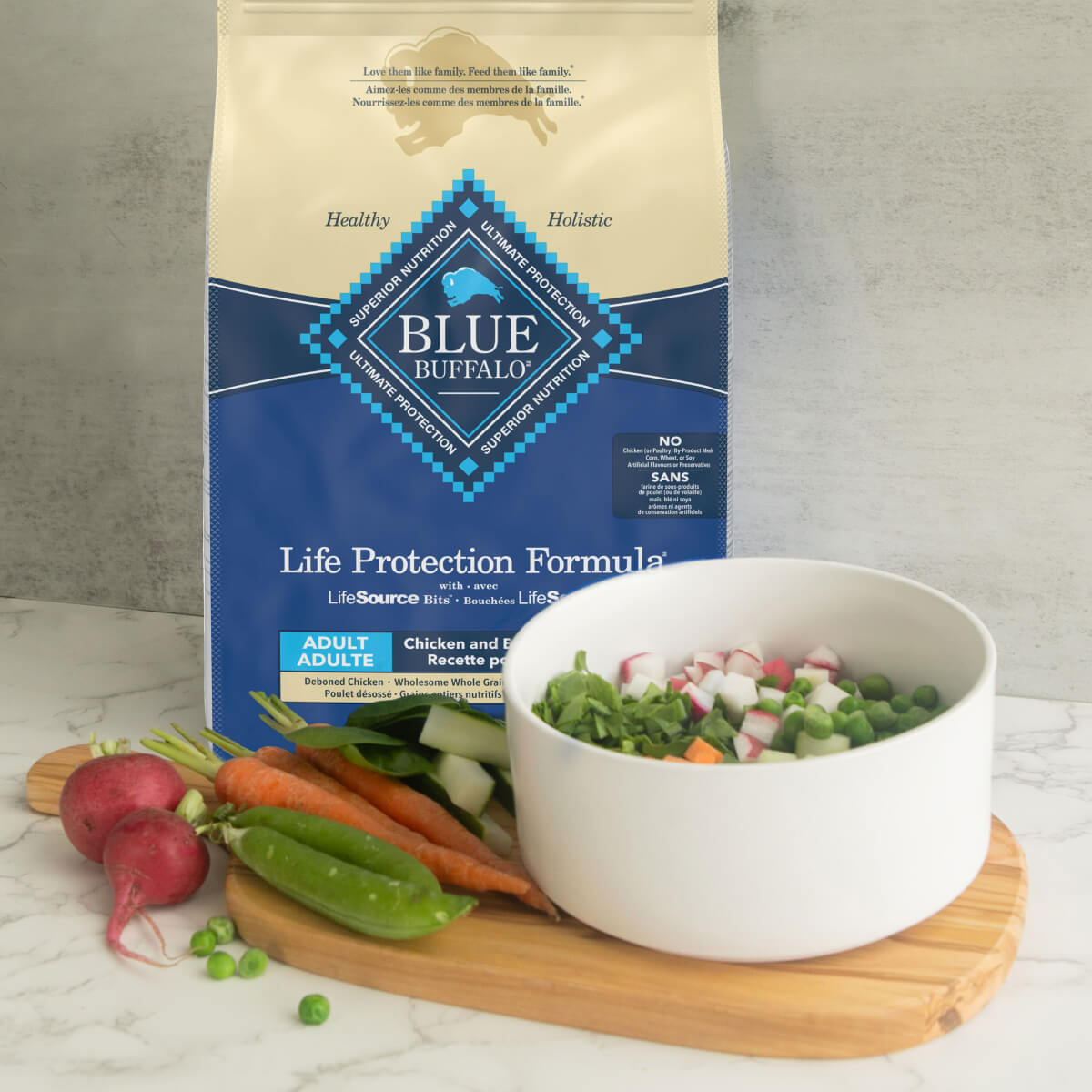 Nutrient-rich Blue Buffalo Life Protection Dog Food along with a white bowl showcasing a healthy and delicious ingredients, perfect for your dog's springtime health