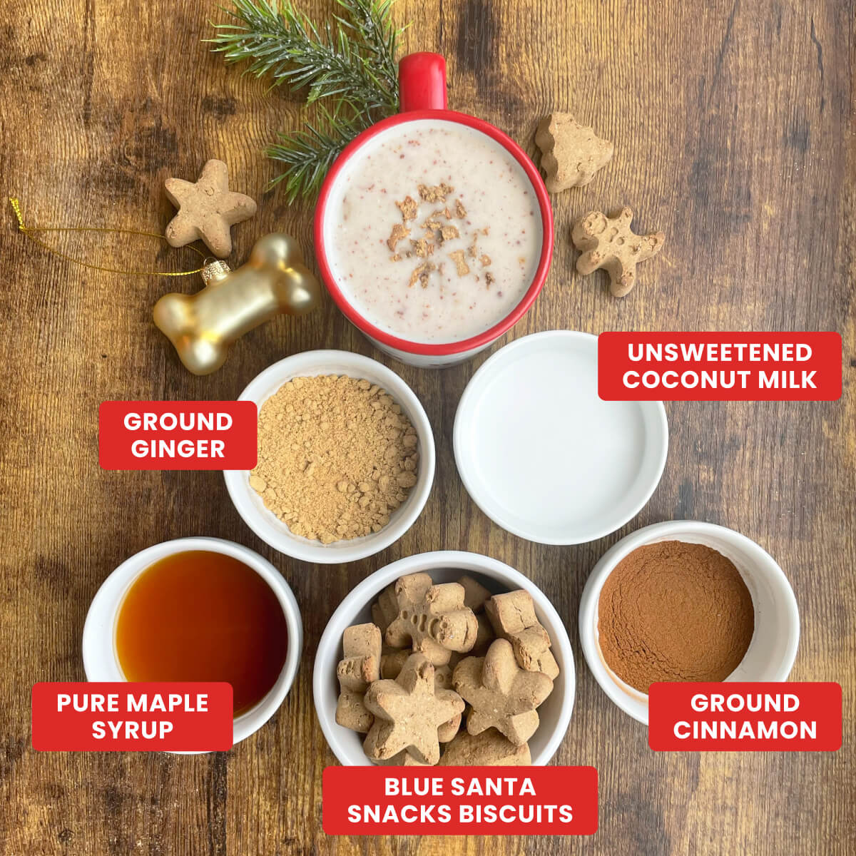 Ingredients for dog-friendly eggnog: unsweetened coconut milk, ground ginger, pure maple syrup, cinnamon, Blue Buffalo Santa Snacks biscuits