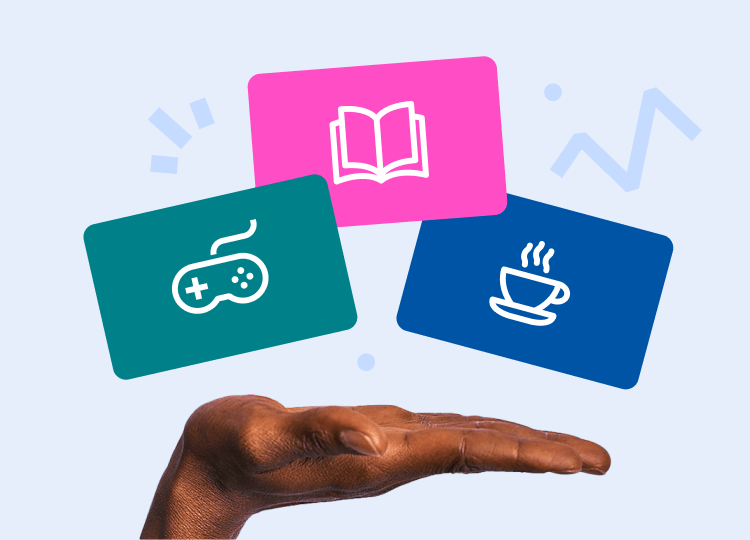 Redeem Your Rewards- A hand with a book, coffee cup, and game controller, capturing a cozy moment of combining reading and gaming.