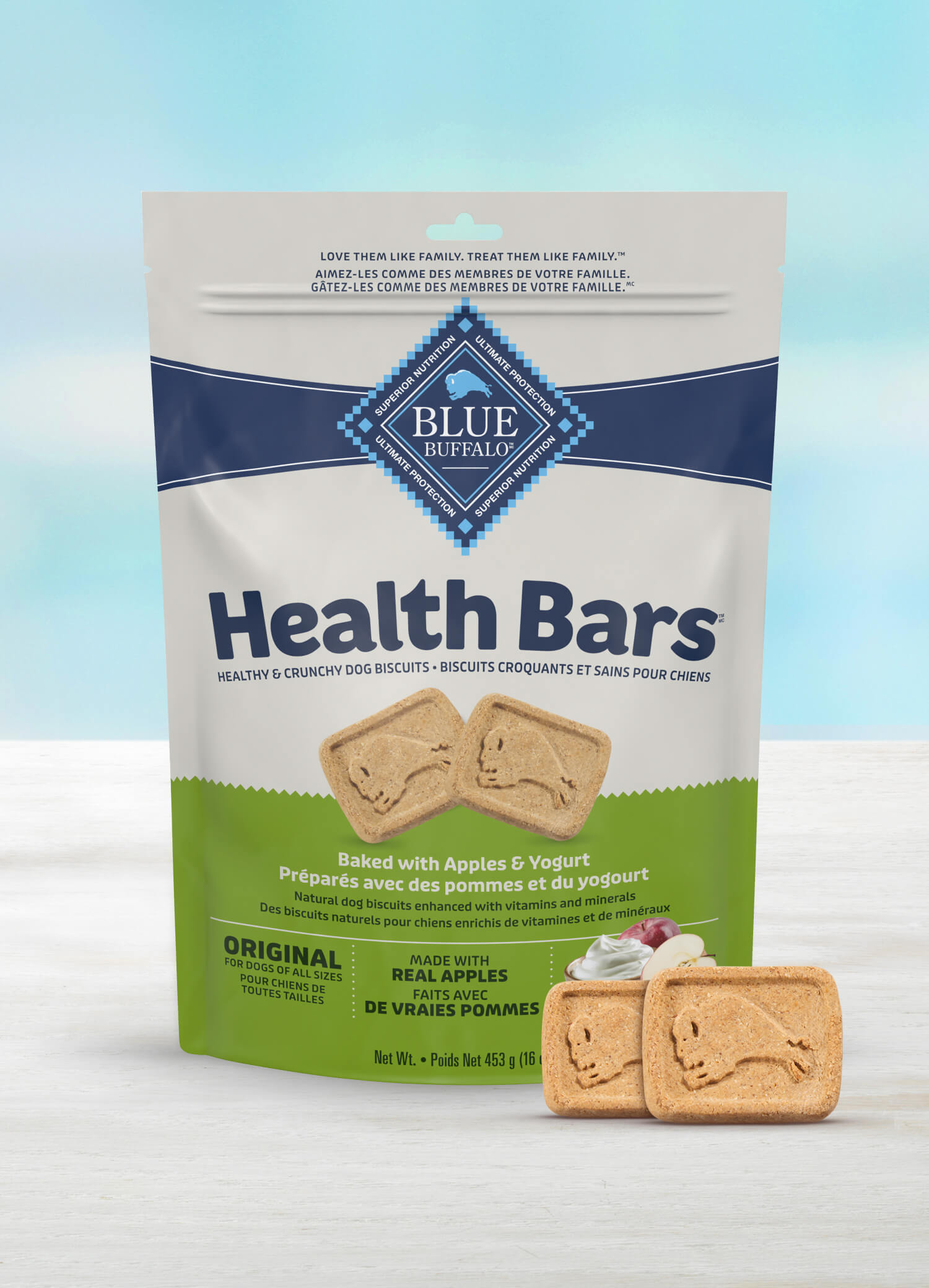 A package of Blue Buffalo Health Bars for dogs, baked with apples and yogurt, showcasing biscuits on the front.