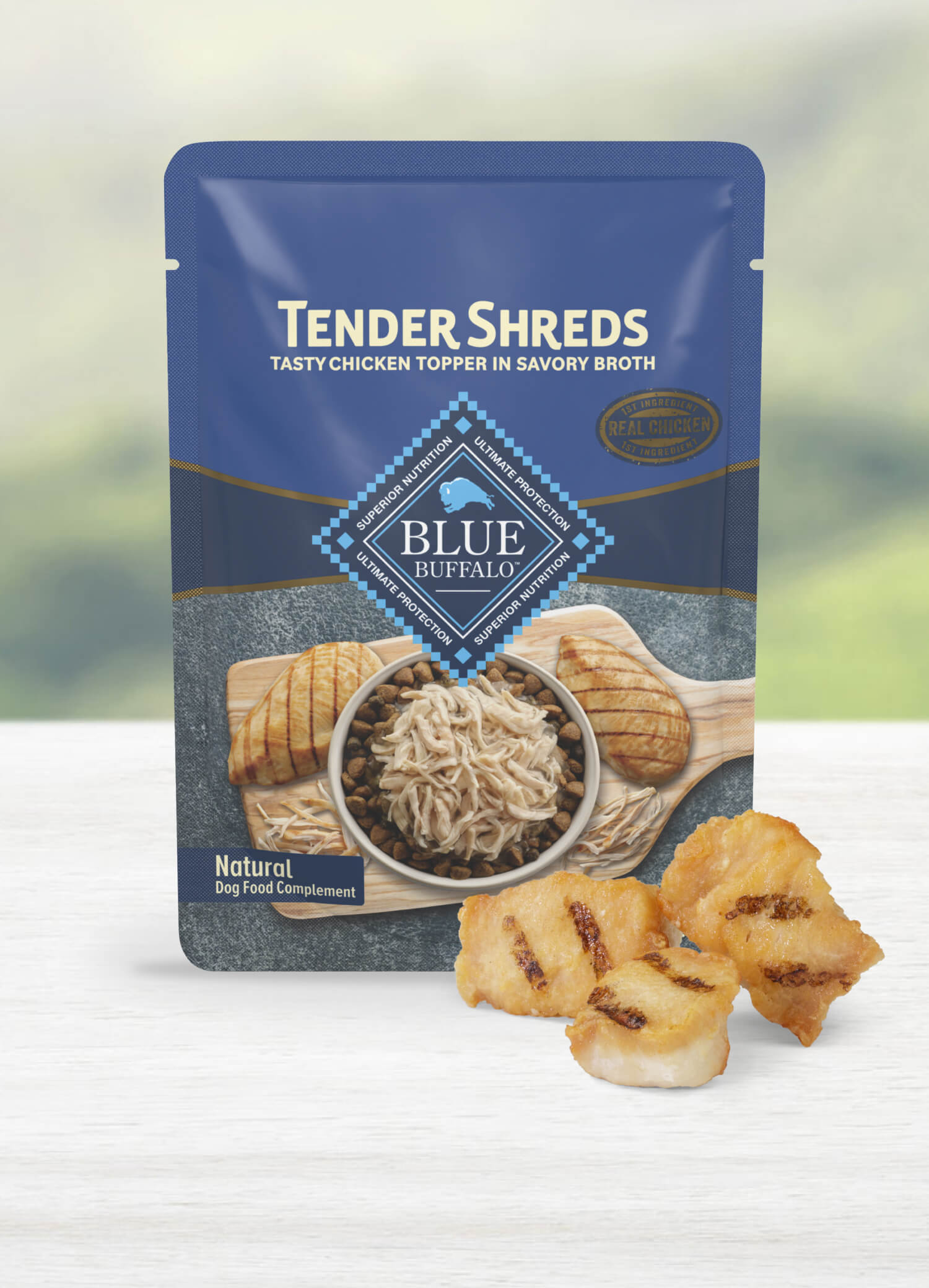 A pouch of Tender Shreds dog food